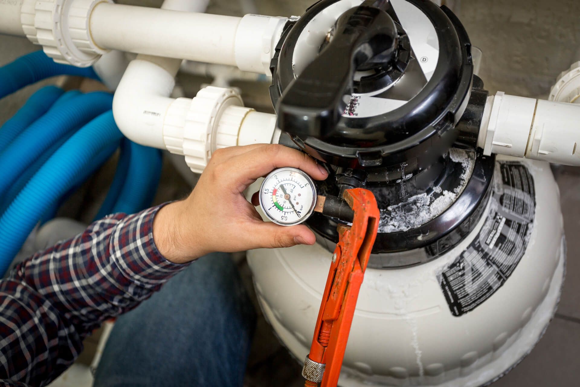 plumber-checking-manometer-on-big-hydraulic-pump-2021-12-14-19-14-24-utc